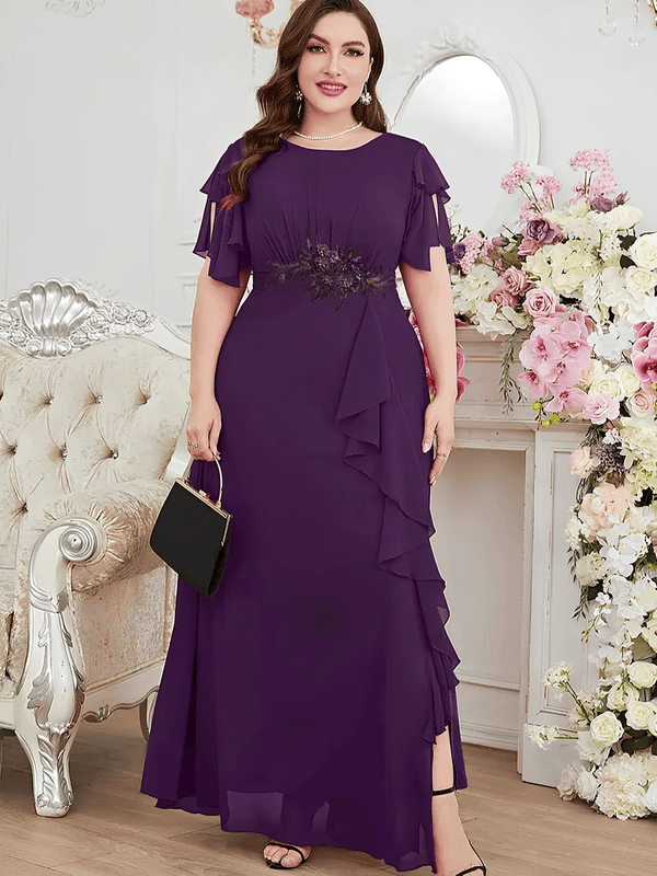 Elegant plus size formal wedding party dress with applique detail in a luxurious setting.