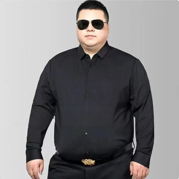 Plus-size model wearing a black slim-fit men's business shirt with sunglasses, showcasing stylish and confident professional attire.