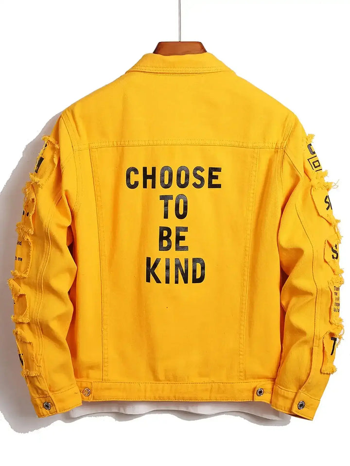 Yellow denim jacket with "Choose to Be Kind" text on the back, featuring distressed sleeves and multi patches.