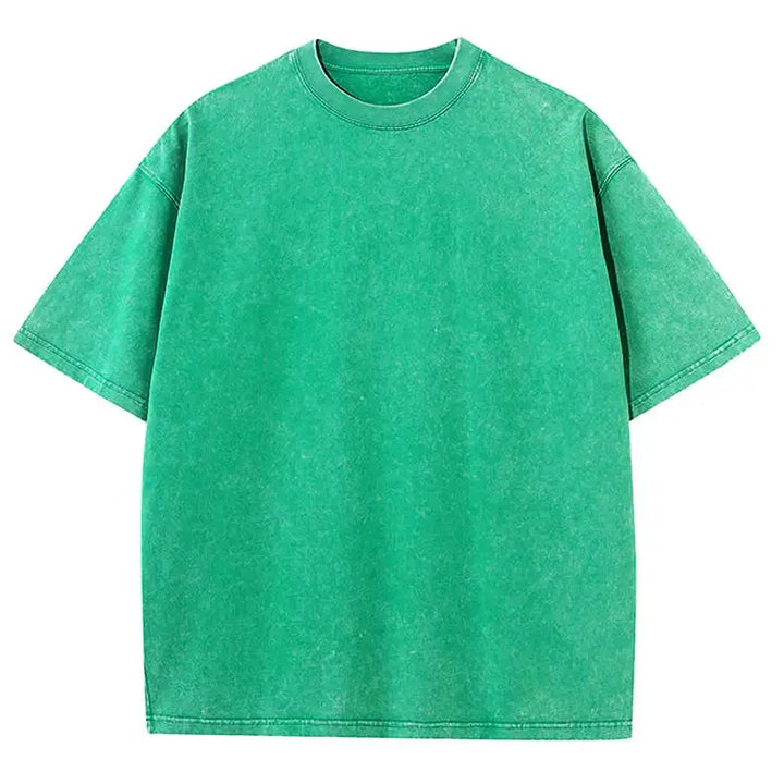 Unisex oversized vintage wash t-shirt in green, showcasing relaxed fit and comfort for men and women, available in sizes S-2XL.