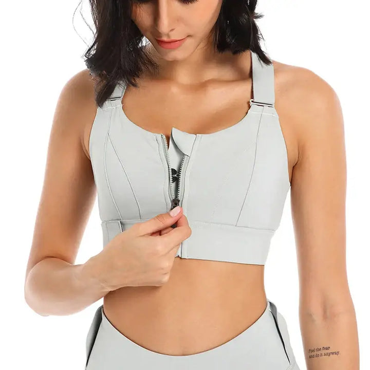 Front zipper high impact sports bra for plus size women, offering comfort and support during workouts.