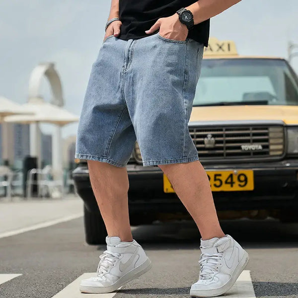 Men's plus size denim shorts for casual summer comfort in urban setting