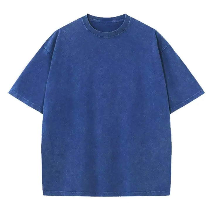 Unisex oversized vintage wash blue t-shirt for men and women, relaxed fit, perfect for casual or chic outfits, sizes S to 2XL.