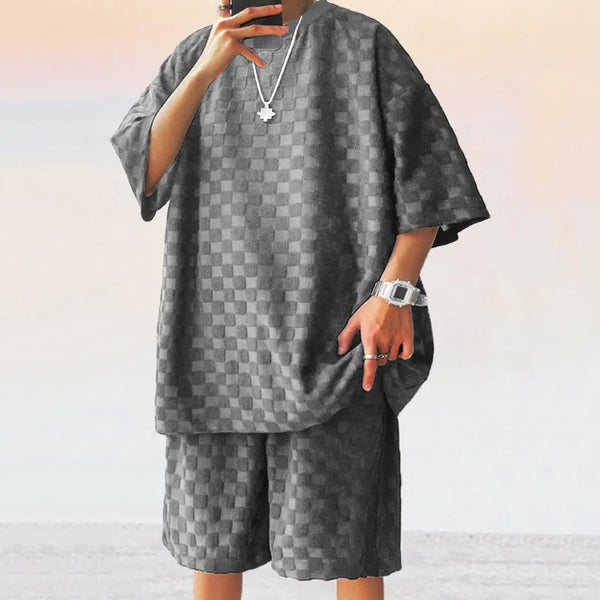 Oversize checkered T-shirt and shorts set for plus-size men, ideal for casual spring and summer wear.