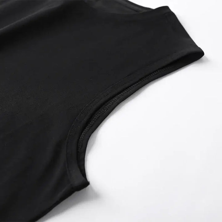 Close-up of a black plus size tank top for men, showcasing soft fabric and a comfortable armhole design.