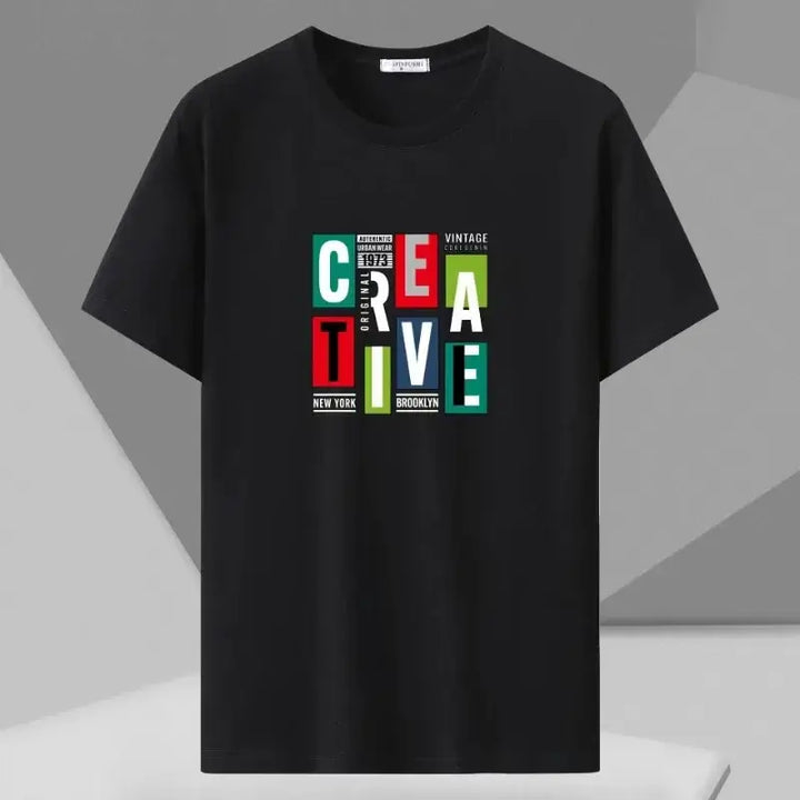 Plus size man wearing an oversized black cotton T-shirt with "CREATIVE" graphic print