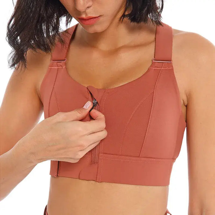 Plus size front zipper high impact sports bra for women, offering comfort and support during workouts.