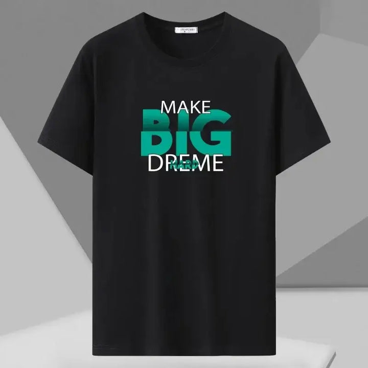 Plus size man wearing an oversized black cotton T-shirt with "MAKE BIG DREAMS" graphic print